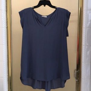 XL lightweight sleeveless nylon shirt.